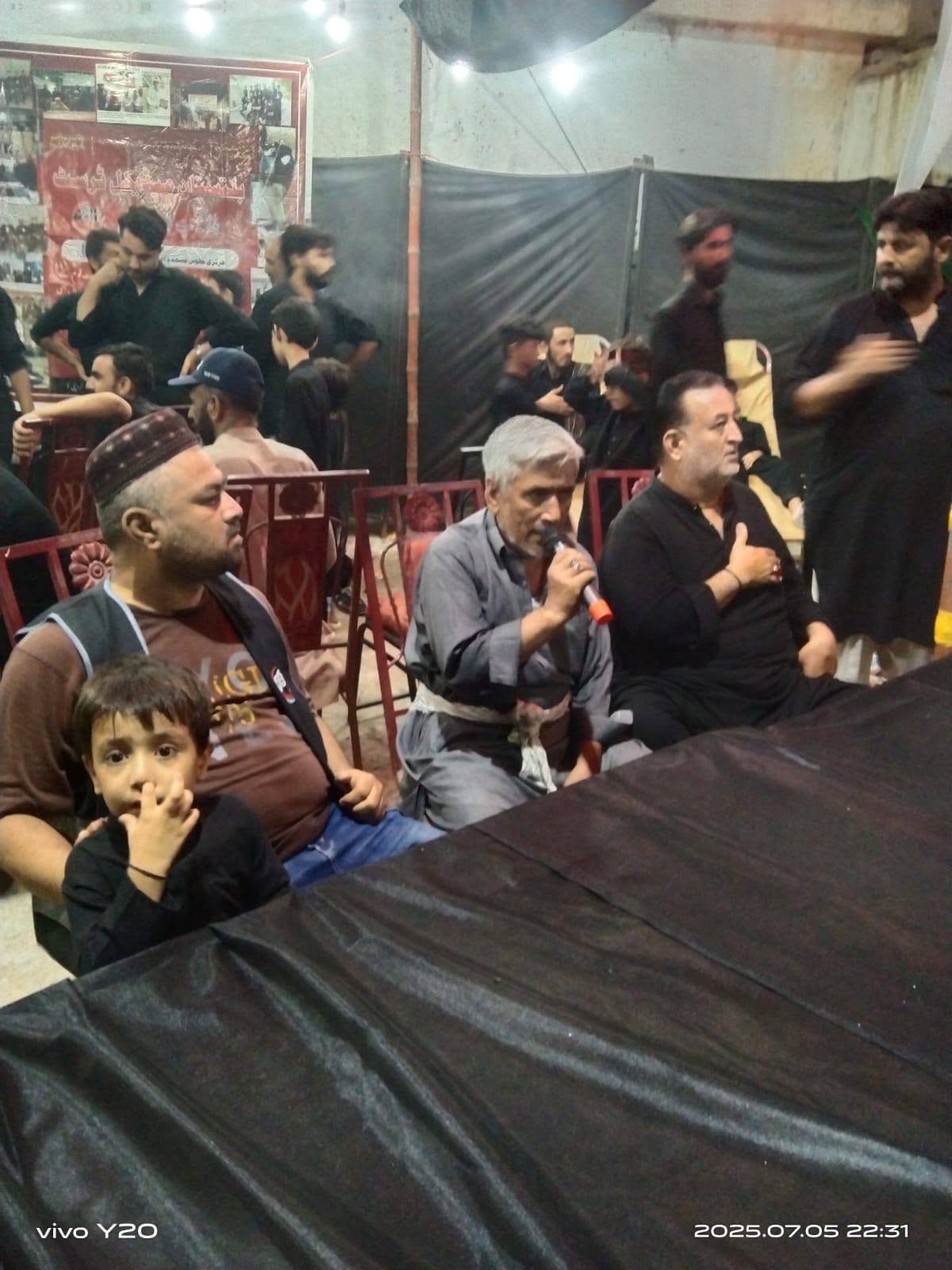 Community gathering at a BMT camp during Ashura